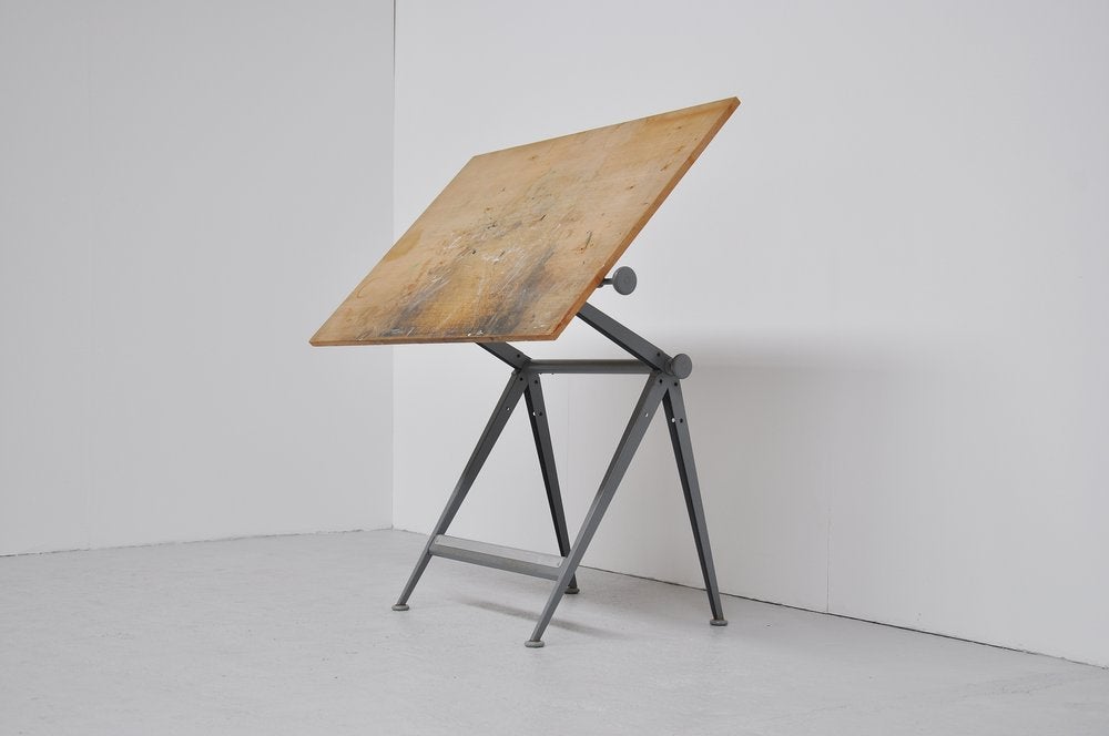 Very nice and important Industrial design by Wim Rietveld in collaboration with Friso Kramer for Ahrend de Cirkel in 1963. This Reply drafting table is adjustable in many diffrent positions and heighs. This table won a ´Signe d´Or´ in Bruxelles in
