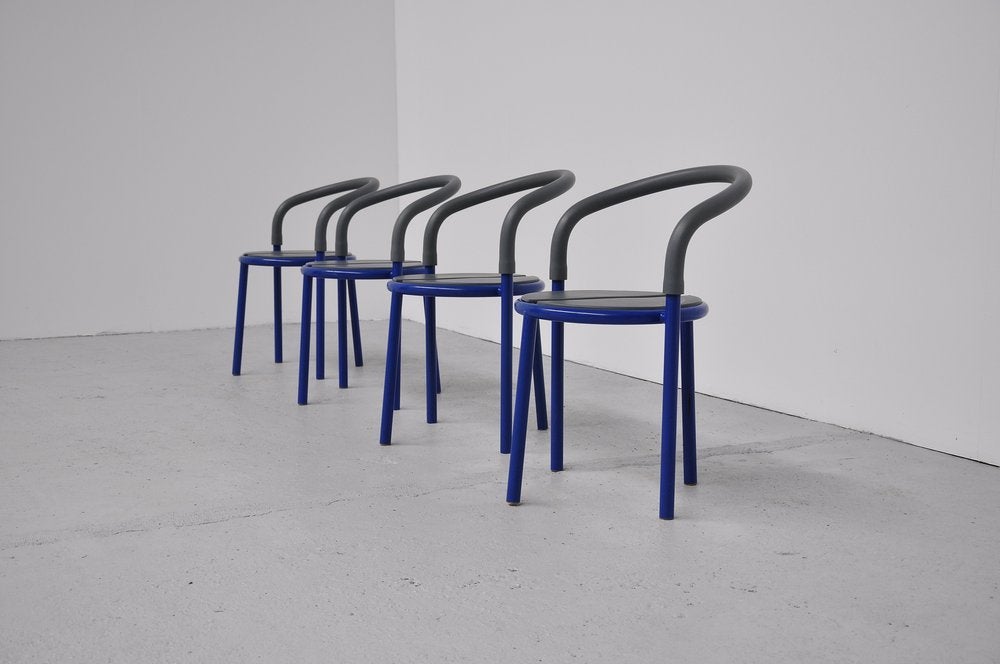 Very nice garden chairs designed by the Niels Gammelgaard for Fritz Hansen. Very nice shiny blue lacquered metal and rubber seat and back. Can be used outdoors, easy to clean. All in good condition and all marked. Priced each 18 in stock.