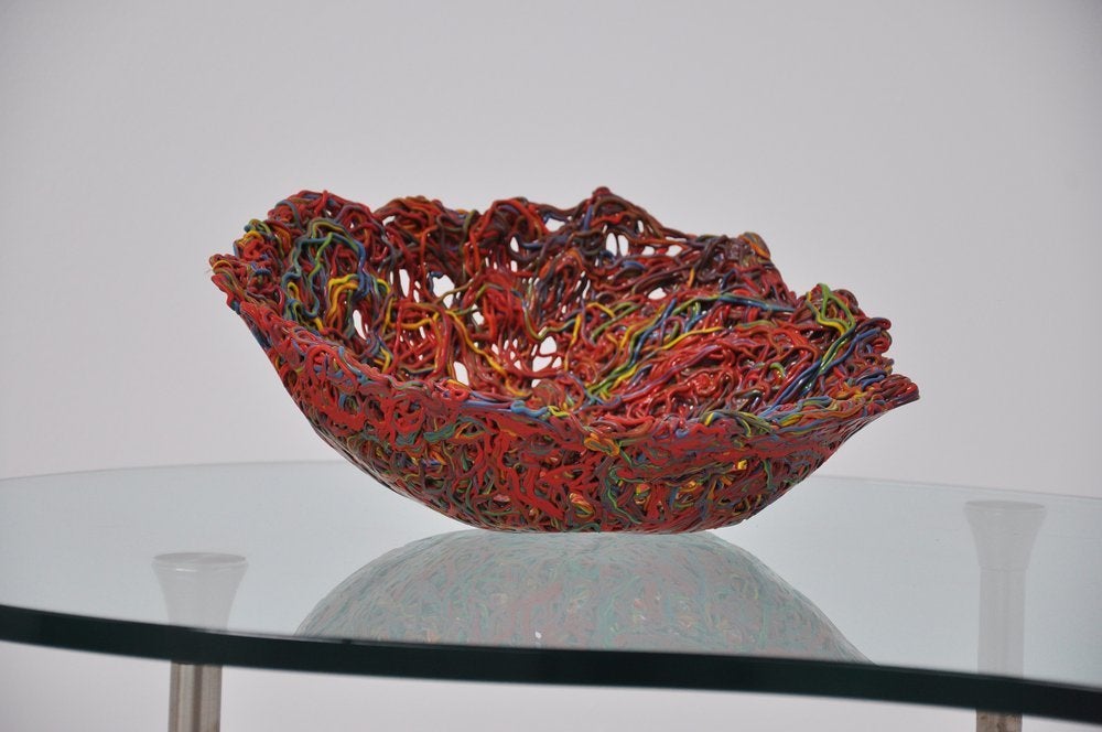 Very nice colored rubber bowl designed by Gaetano Pesce for Fish Design, Italy, 2004. Gaetano Pesce was known for its plastic, rubber free-form shapes and designs in all colors and shapes. This is for a spaghetti bowl from 2004 and is in very good
