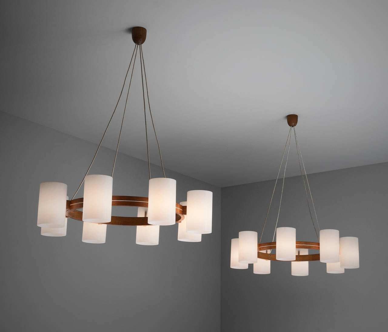 Scandinavian chandelier by Luxus.

Large sculptural wooden chandelier with eight spheres.
The wood is solid and the shades reflexes the light perfect which creates a nice soft diffuse lighting in the surrounding space.

Currently one
