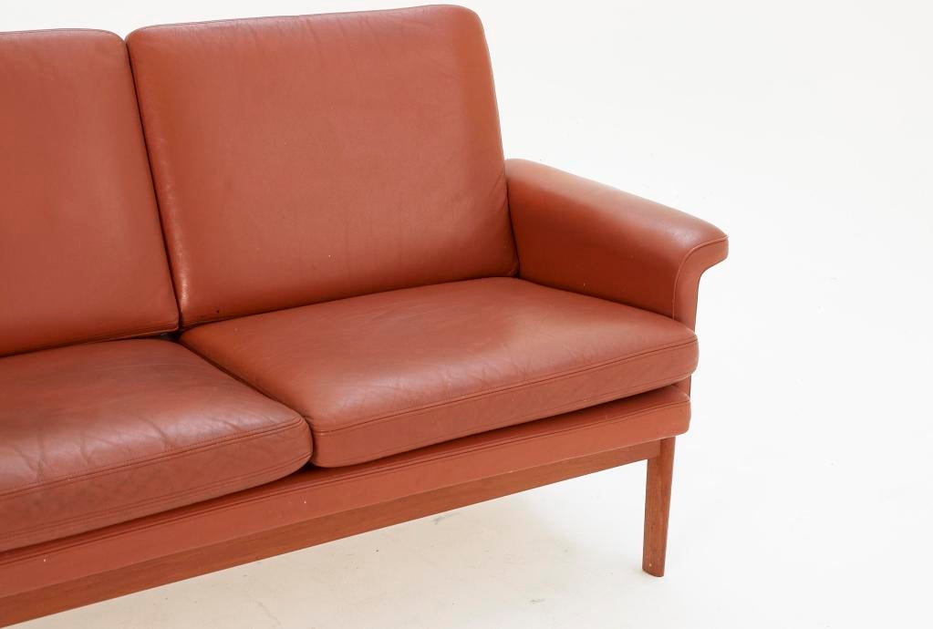 Finn Juhl 3 seater sofa with 'rusty' orange leather and teak 1