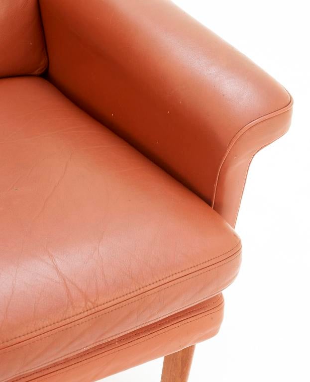Finn Juhl 3 seater sofa with 'rusty' orange leather and teak 3