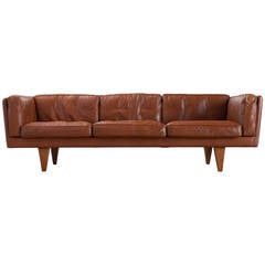 Illum Wikkelsø Three-Seat Sofa in Brown Leather and Down Filled