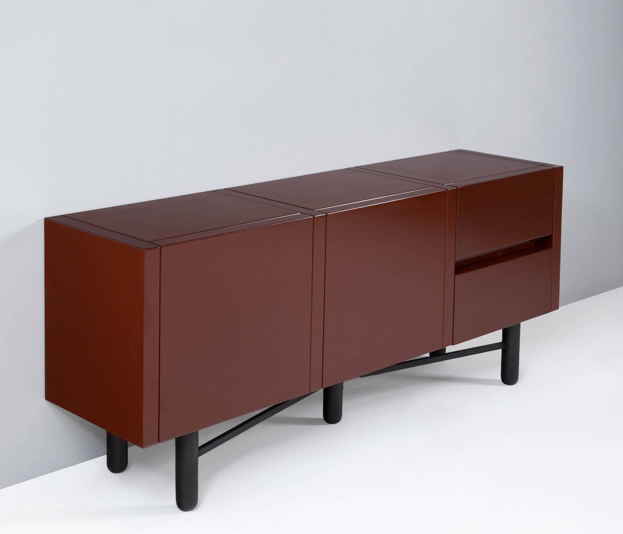 Credenza in wood for Roche Bobois, France, 1970s. 

Unusual sideboard high gloss red lacquered. The high gloss red lacquered panels are in wonderful contrast with the dark stained solid wooden frame. Provide plenty of storage facilities.
