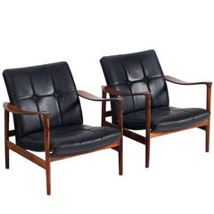 Pair of Easy Chairs in Black Leather