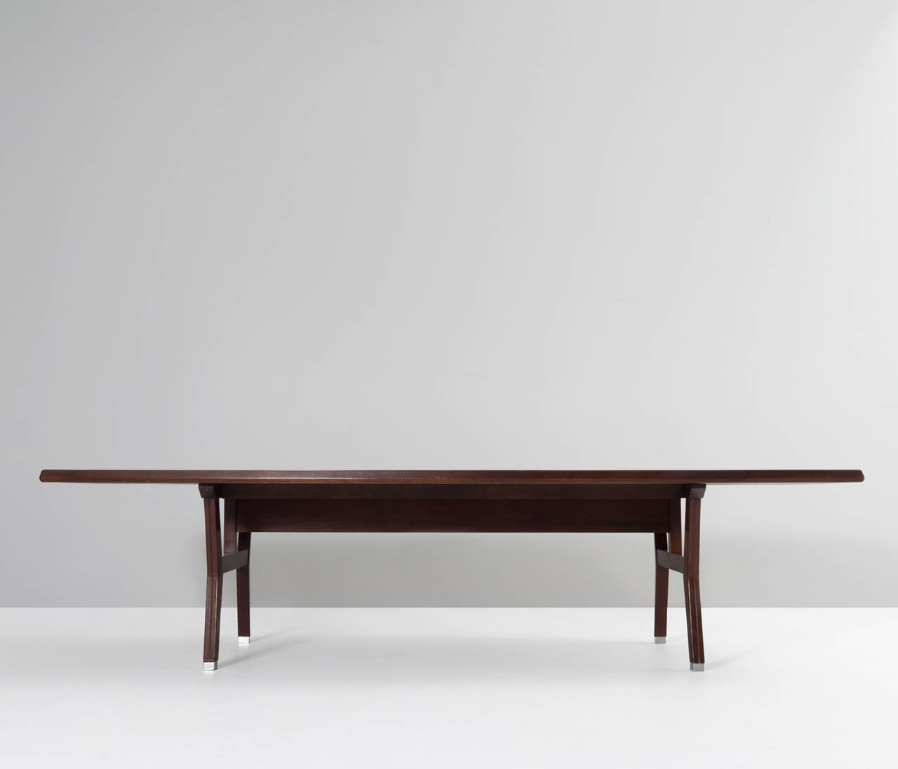 Ennio Fazioli and Ico Parisi for MIM Roma, Tolomeo series (based on original Terni desk by Parisi), Italy, 1960s.

Extra large dining table. Equipped by two typical, Parisi, legs which give this table a very elegant but solid base. The top is boat