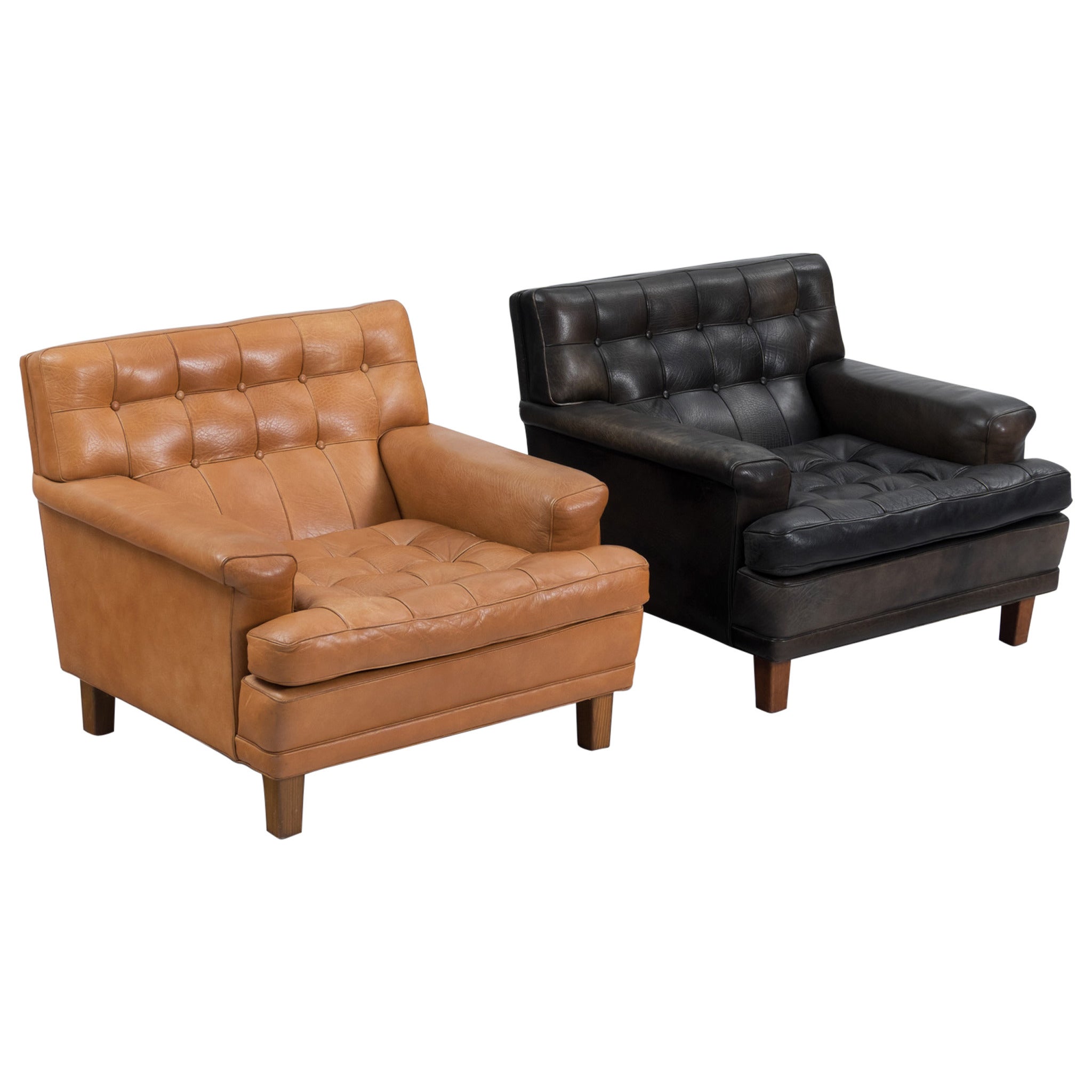 Arne Norell Pair of Easy Chairs in Black in Cognac Leather