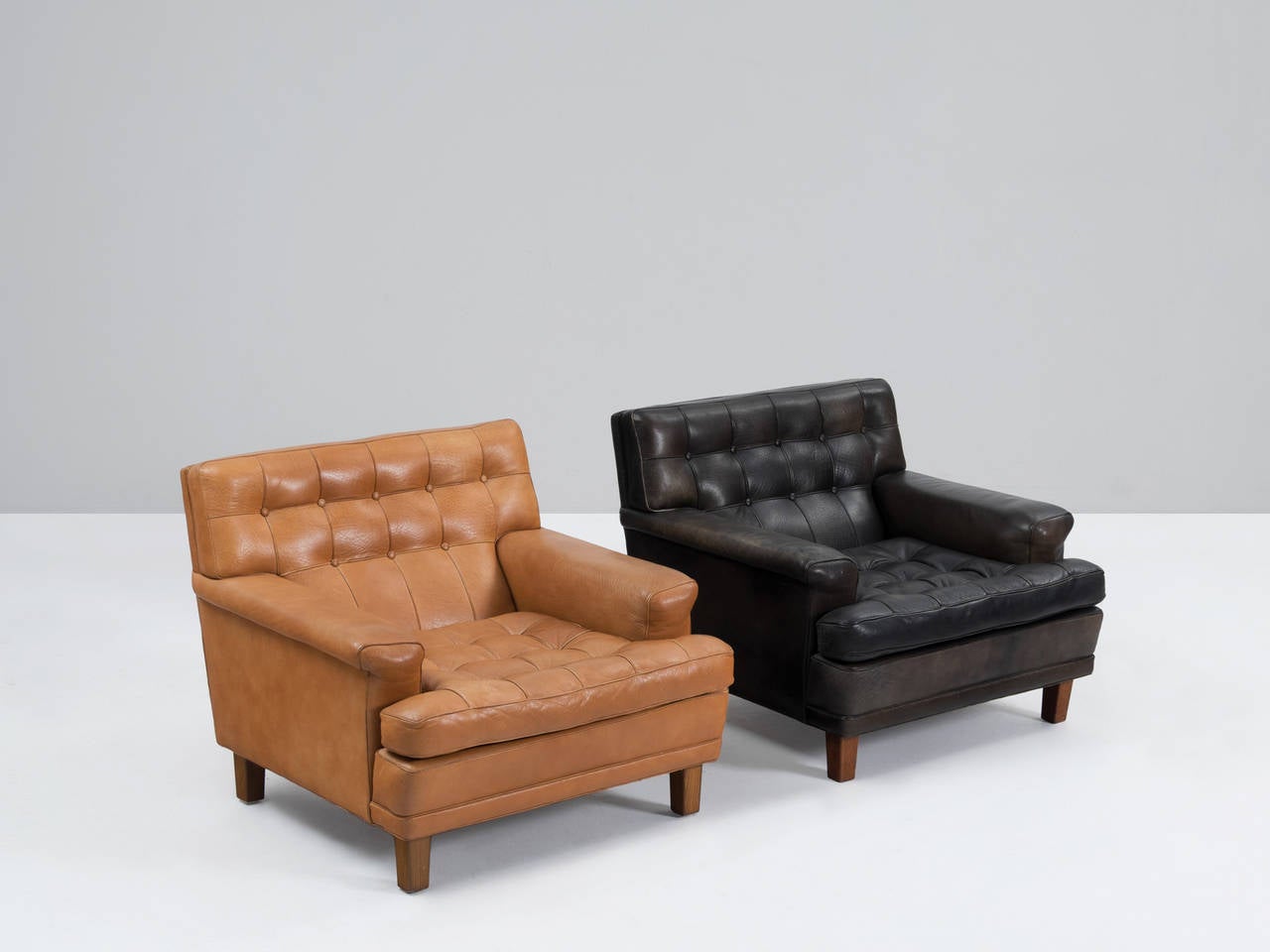Mid-20th Century Arne Norell Pair of Easy Chairs in Black in Cognac Leather
