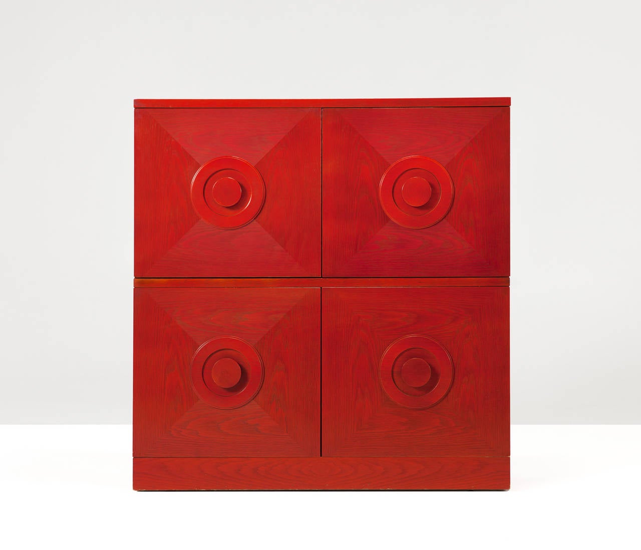Sideboard, in oak, Belgium 1970s. 
 
Very unusual red stained oak chest/high credenza. The red stained surface has a very intense appearance and can color up any kind of interior, or nicely blend into a vivid existing interior. This Brutalist high