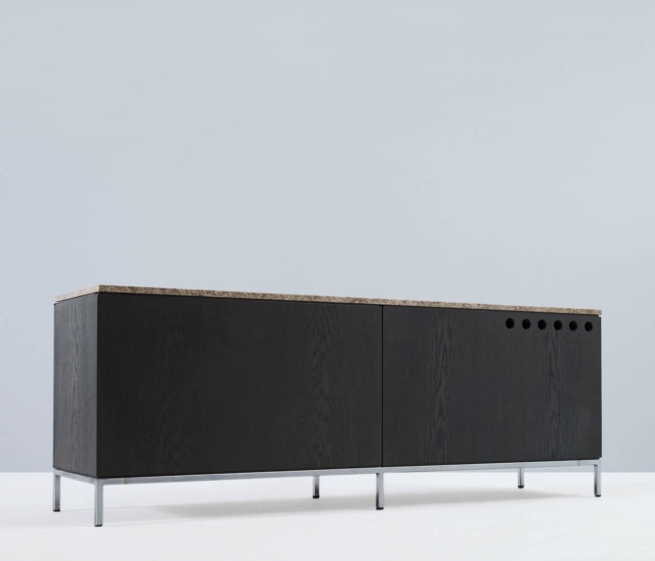 Sideboards, in oak, marble and metal, by Florence Knoll for Knoll International, United States. 

Credenza with chromed base designed by Florence Knoll for Knoll International. This exceptional and minimalistic designed credenza has elegant