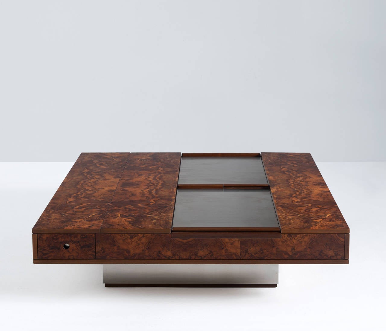 Cocktail table, in burl and steel, Europe 1970s. 

Large square coffee table with integrated dry bar. Very functional due to plenty of storage facilities. This beautiful made, solid looking coffee table can be unfolded to reveal the hidden
