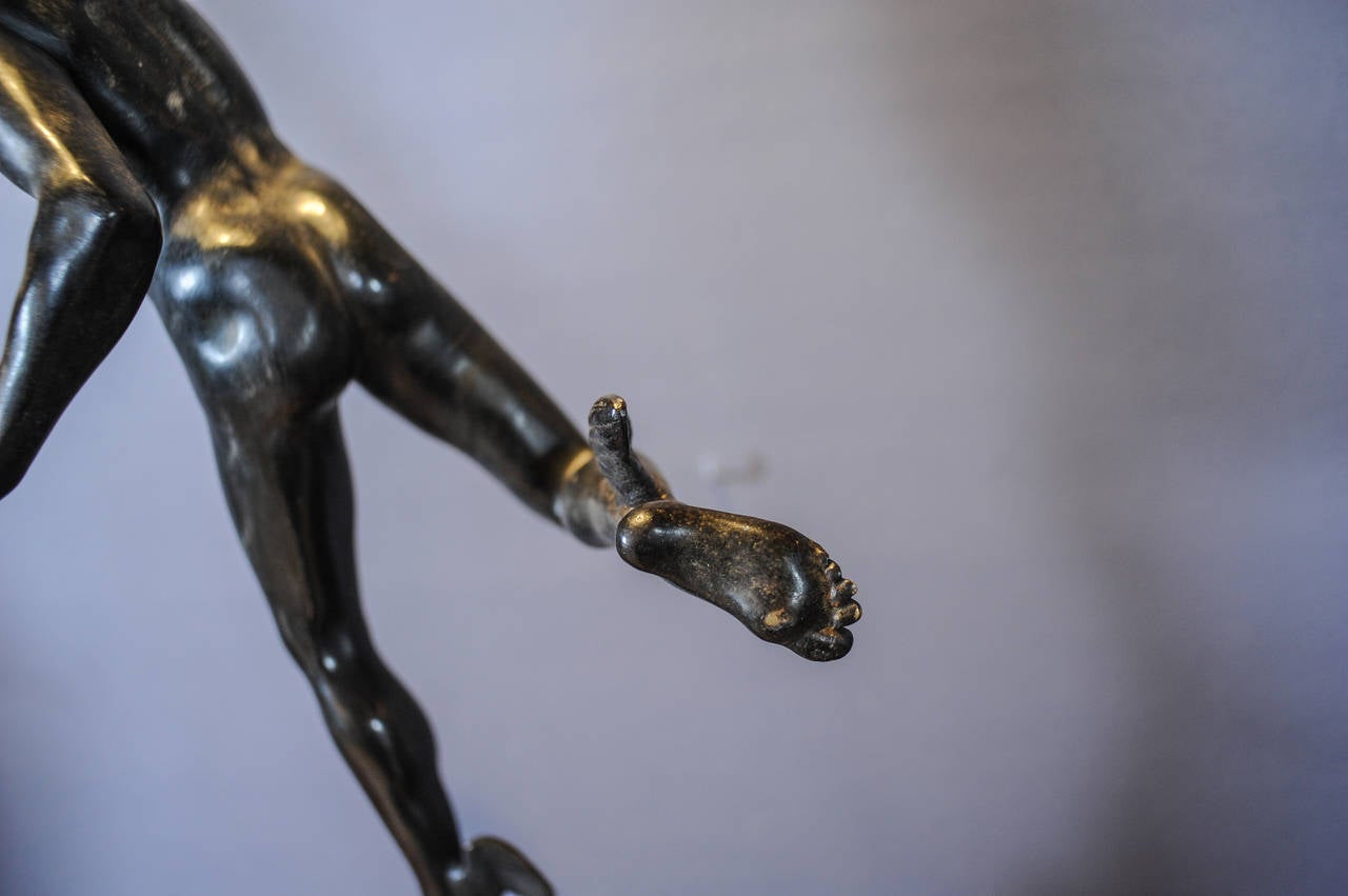 Bronze A large patinated bronze sculpture of Hermes / Mercury after Giambogna