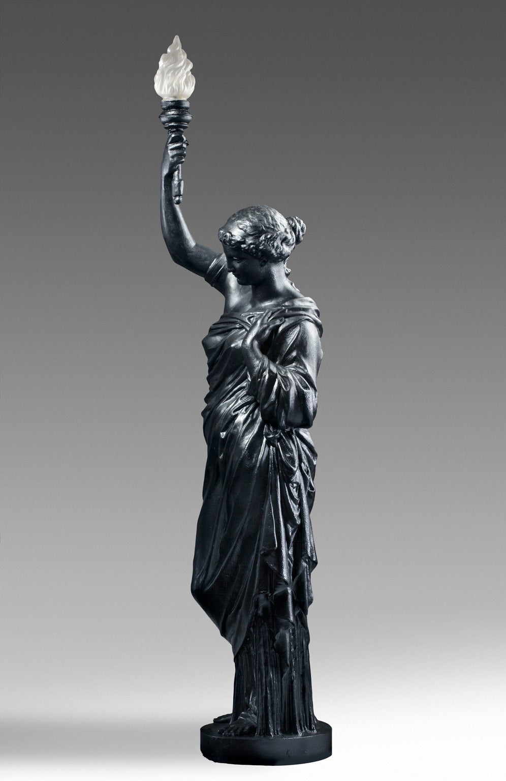 Stamped Tusey Meuse,' the maiden portrayed as standing and draped in the classical manner, the torchere held aloft in her raised right hand.

Pierre-Adolphe Muel established a foundry at Tusey in the Meuse district between 1832 and 1835, gaining
