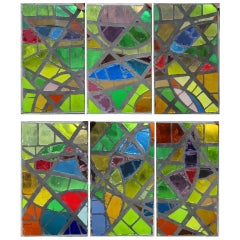 A serie of 6 coloured glass-in-cement windows