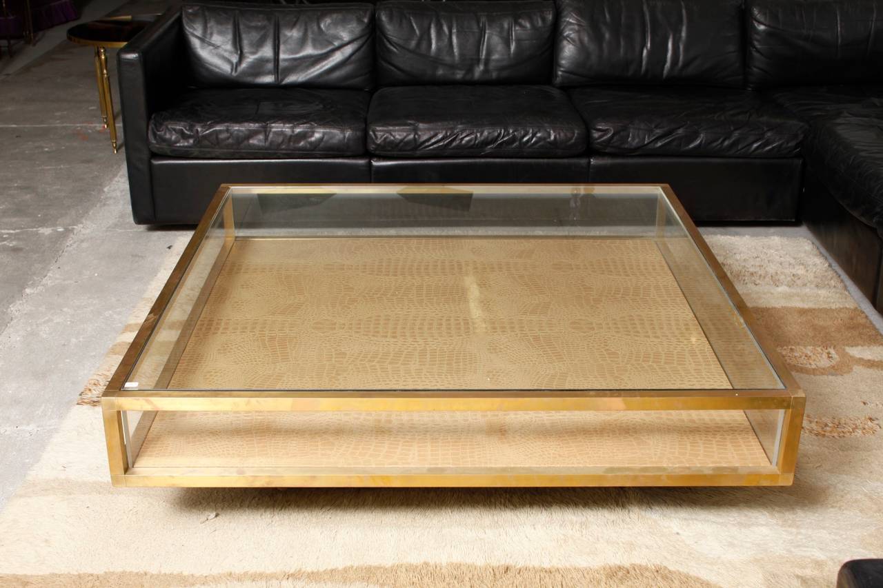 Large square vitrine coffee table
brass frame and base
Ideal display table

we ship worldwide