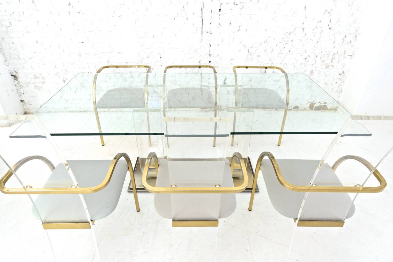 Dining table with a Brass and perspex base
and clear Glass table top
by Maison Jansen
France, 1970s 

We deliver worldwide

Contact us for further info