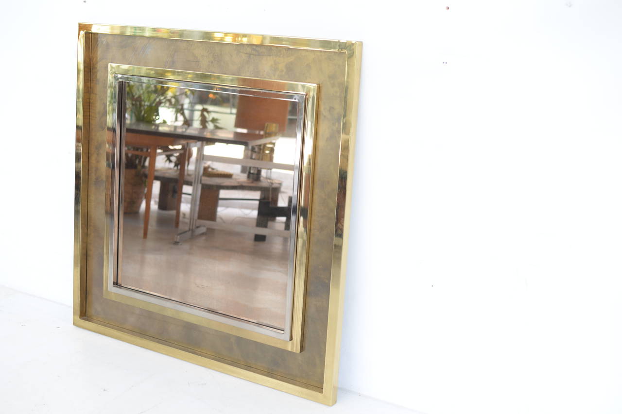 Stunning Mirror by Maison Jansen
Brass frame / chromed steel / tainted mirror
France , ca 1978

We have worldwide shipping solutions

High res pictures available on request