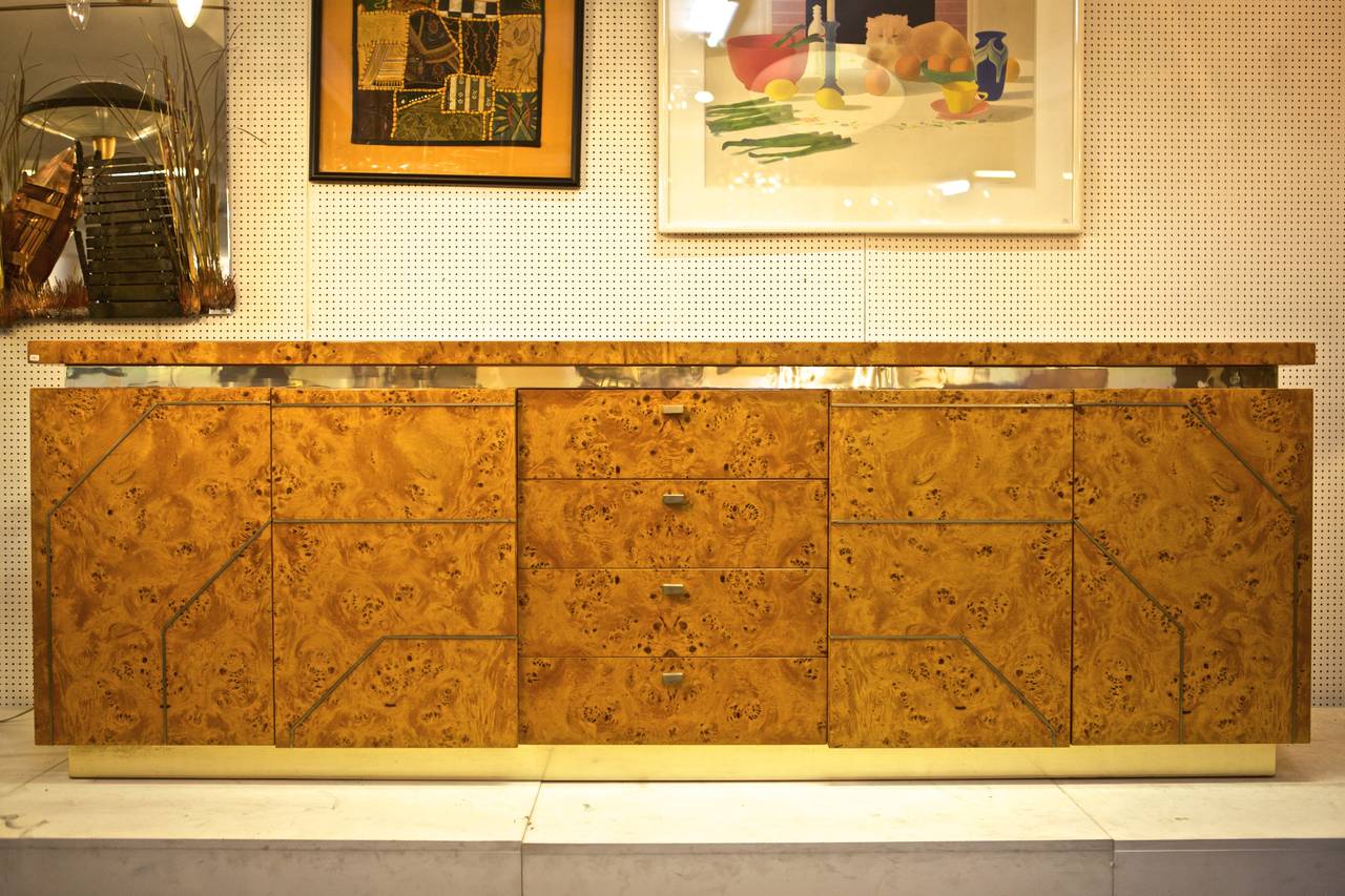 Hollywood Regency style sideboard
Burlwood veneer with brass details
in the style of JC Mahey, Maison Jansen, Willy Rizzo ,
France, 1980s