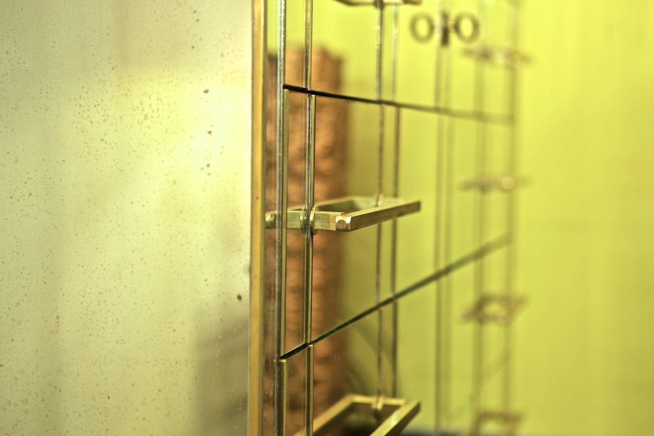Mid-20th Century Mirrored Cabient with Brass Details