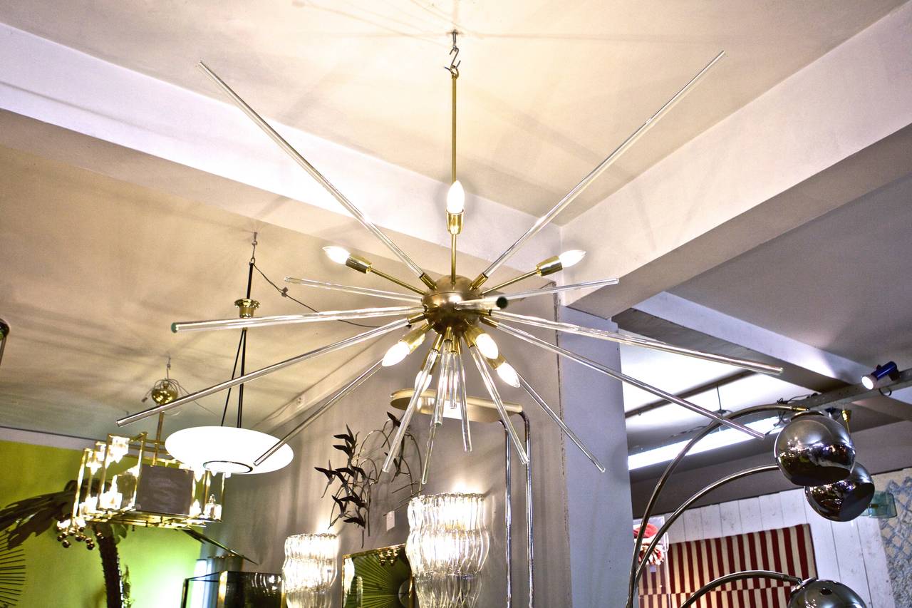 Stunning Brass & Lucite Sputnik chandelier
a Pair is available 
Ø 144 cm x H 108 cm
Italy, 1970s

we have worldwide shipping solutions
