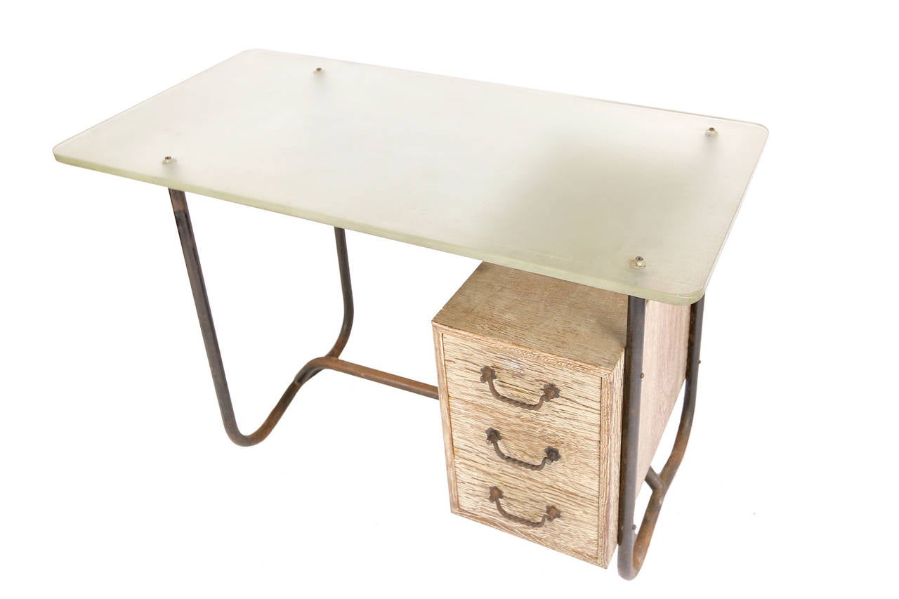 Modernist desk in the manner of Jean Royere
Solid Saint Gobain glass top, oak, muffled steel
Original stool included
provenance: used to belong to the mayor of Biarritz