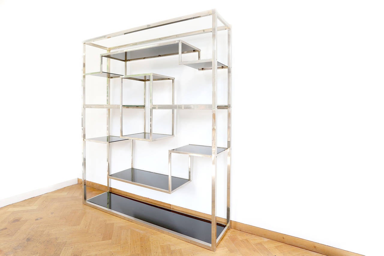 Room divider / Wall Unit / Etagere
by Romeo Rega, Italy, 1970s
Polished chrome steel and black mirrored glass
H 190 cm x W 160 cm x D 40 cm