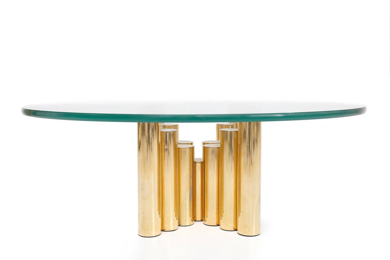 Tubular cityscape  brass base
thick round glass top
USA, 1980s