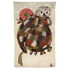 A woolen "owl" wall carpet