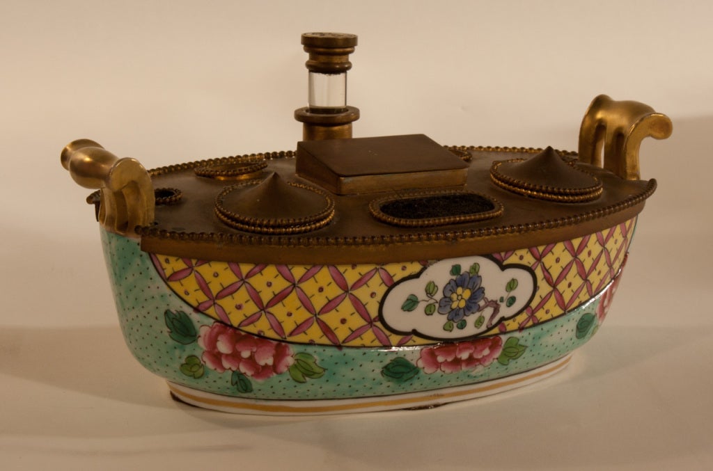 Antique, porcelain & bronze inkwell with ormolu handles, unknown mark on bottom, floral design with wax seal marked B, hinged double compartment for stamps, self-contained blotter. A unique, ornamental accessory.