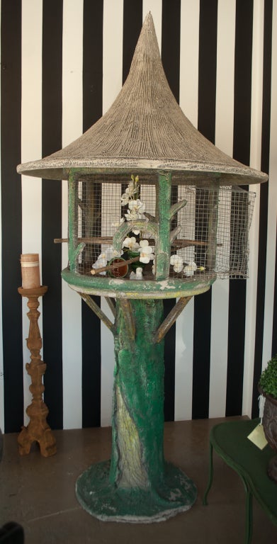 Faux bois cement birdcage that comes apart in three pieces. It was used as an outdoor 