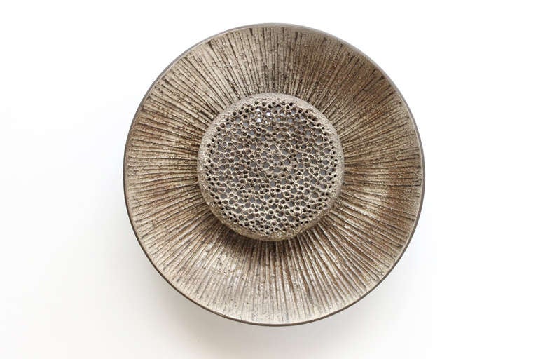 Ceramic light sculpture by Danish artist Sejer. Volcanic diffuser pivots on brass armature.