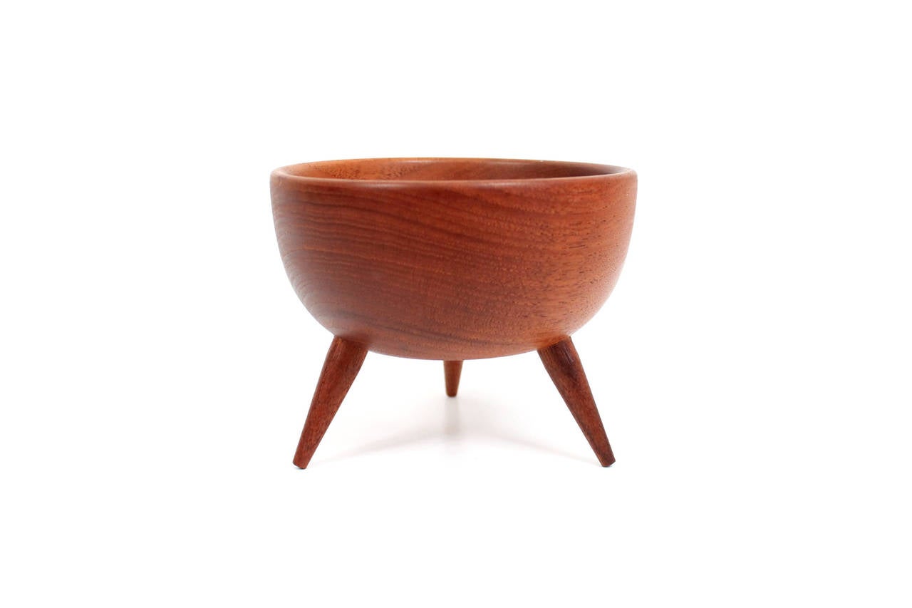 Sculptural teak three legged bowl or mortar.  Made by Swedish firm Akta and designed by Karl Holmberg.  Signed with Akta brand to the underneath.