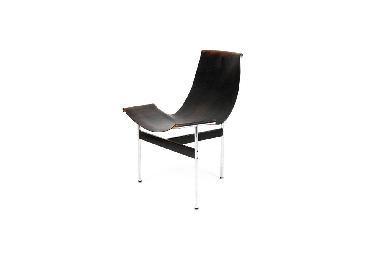 Excellent example of the iconic T-chair designed by Katavolos, Littell, and Kelley for Laverne International.  Original leather sling has pleasing patina fading from black to brown in areas.  The perfect statement chair for a writing desk.