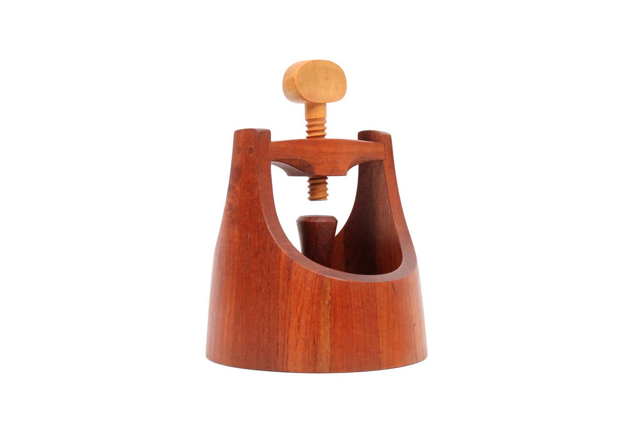 Sculptural nutcracker in staved teak designed by Jens Quistgaard for Dansk. Fully functional. Signed with the early floating ducks Dansk brand.