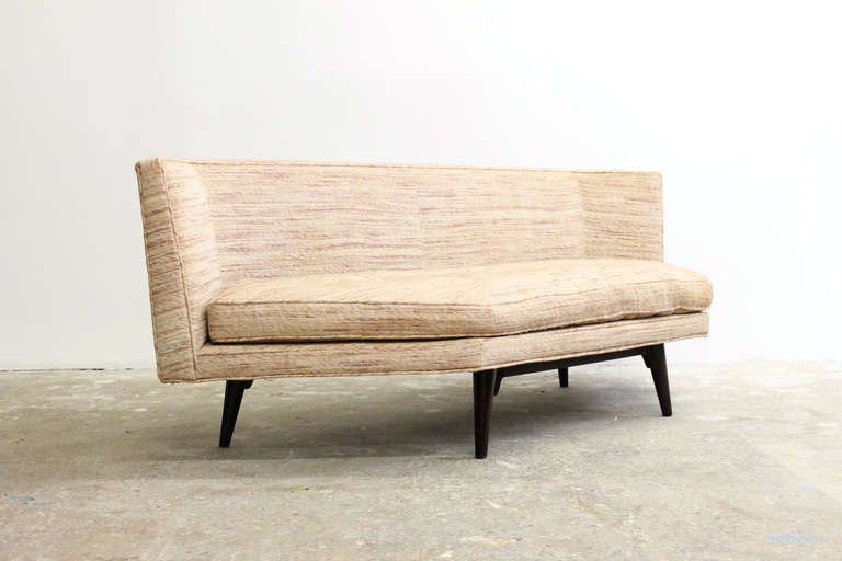 Elegant and modern armless sofa by Edward Wormley for Dunbar. This sofa is part of a sectional seating group and can stand alone or be combined with the other pieces offered here.