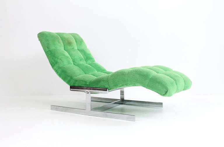 Wave chaise lounge by Milo Baughman on a chromed metal base with original tufted upholstery.  Very comfortably designed seating.