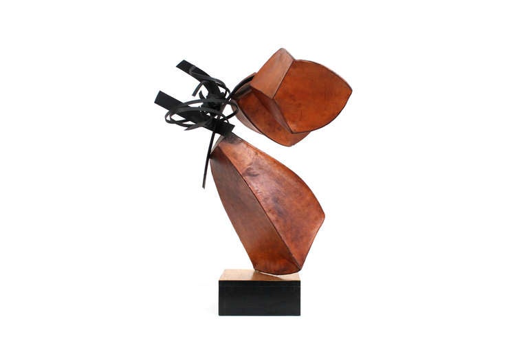 Large-scale tabletop sculpture made of leather and blackened steel mounted on a gold leaf painted wooden base. Floating quality and Brutalist feel to this piece. Superb patina to leather. Unknown artist, in the style of sculptor Albert