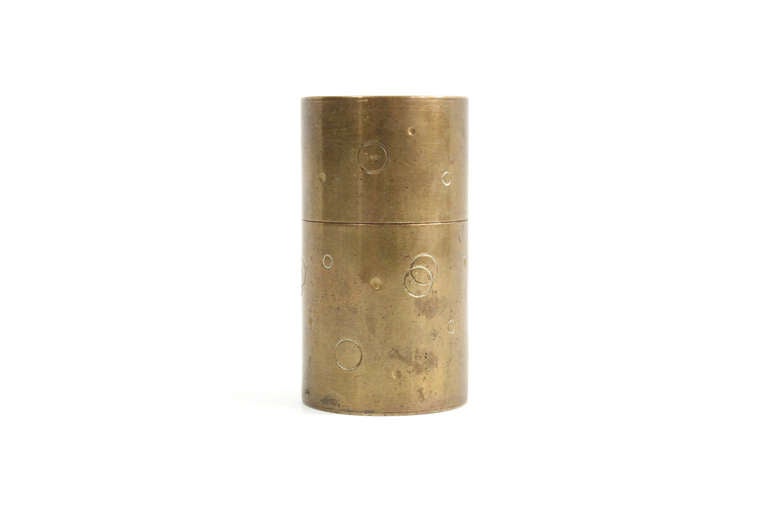German lidded box or canister by Hayno Focken. Brass with circular and interlocking circular impressed designs.
