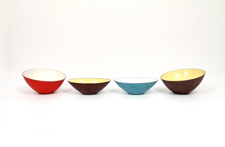 Seldom seen collection of four Italian decorative bowls in enameled metal. Designed and imported by Raymor. Asymmetrical and unique forms in a charming period color palette. Signed with Raymor stickers. Dimensions below are for smaller almond shaped