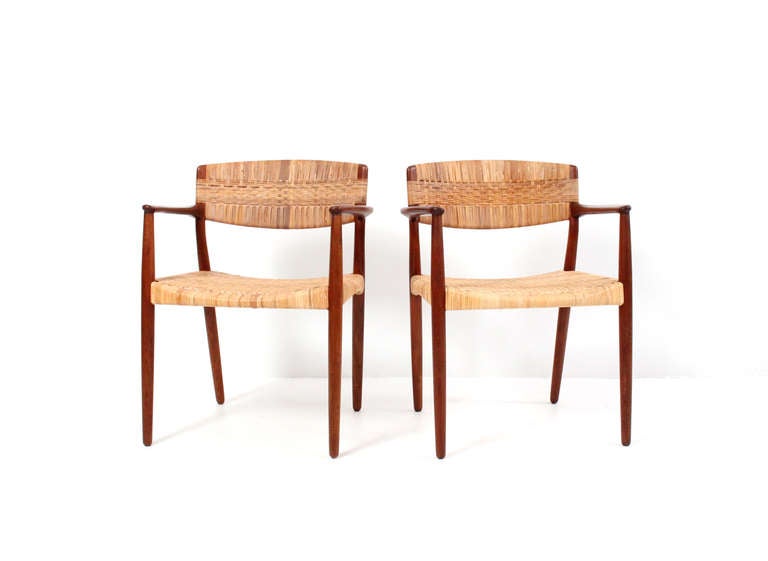 Pair of Teak and Cane Arm Chairs by Larsen and Madsen