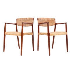 Pair of Teak and Cane Arm Chairs by Larsen and Madsen