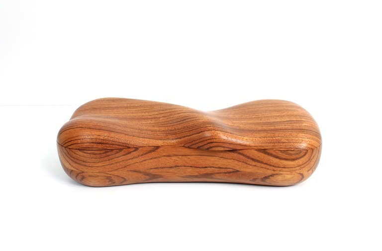 Zebrawood jewelry box with bio-moprphic shaping.  Interior houses several compartments lined in felt.  Suitable for rings, earrings, etc.