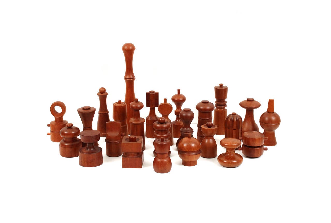 Collection of 25 teak pepper mills designed by Jens Quistgaard for Dansk. Collection includes numerous rarer examples, many mills with their original all metal Peugeot mechanisms. Great opportunity to acquire a considered collection of Dansk mills