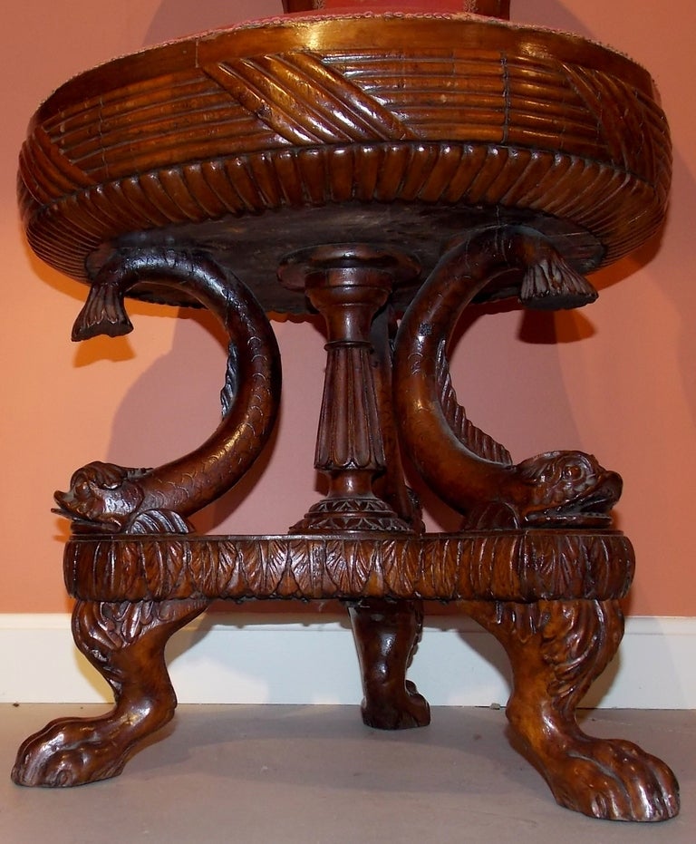 Empire side chair in mahogany attributed to Anthony Quervelle, Philadelphia, circa 1840.  Superb carving of dolphins and claw feet.  Nicely appointed.  An example of this chair is pictured and discussed on page 306 of 