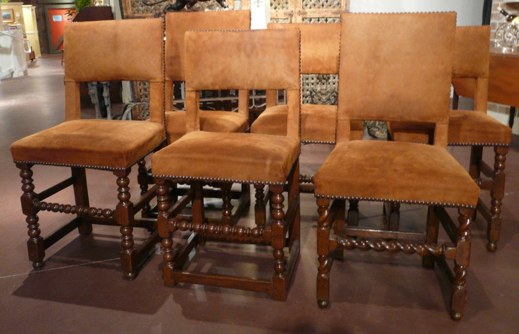 Assembled set of six Cromwellian style chairs with suede upholstery.  Seat heights 20