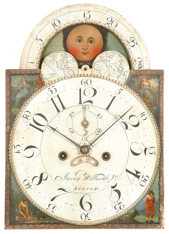 Aaron Willard Jr. tall case clock c. 1808-1815.  Case probably made by the cabinet shop of John & Thomas Seymour
Paul Revere engraved label on waist door.  American dial. Original finials, fretwork, red polychromed weights and wood stick pendulum. 