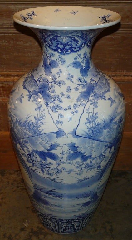 Monumental blue and white Imari porcelain floor vase with superb decoration and color.