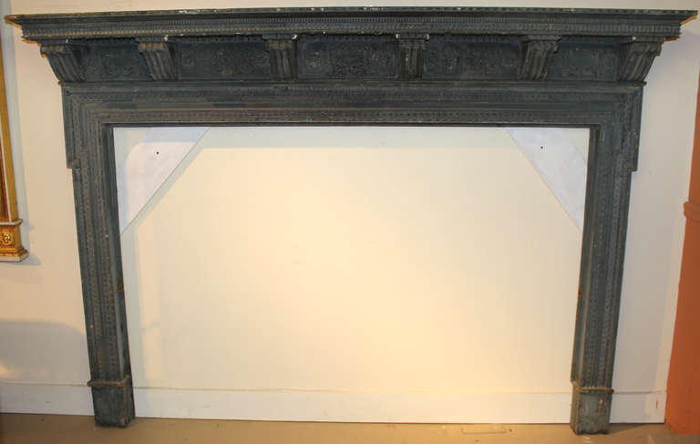 19th c. English fireplace mantel or fire surround in blue polychrome surface. Carved wood with applied plaster/gesso. This would also make a fantastic headboard acting as a frame work for an upholstered interior.