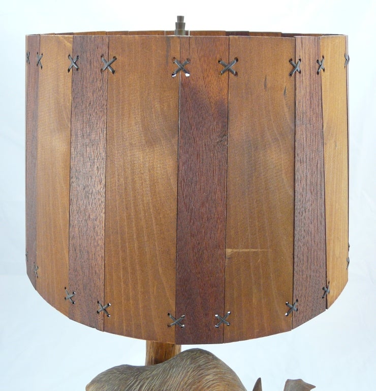 Carved wooden moose lamp with wood slat shade.  Artist signed.  Great patina.  Adirondack or Black Forest type.  Shade measures 9.5
