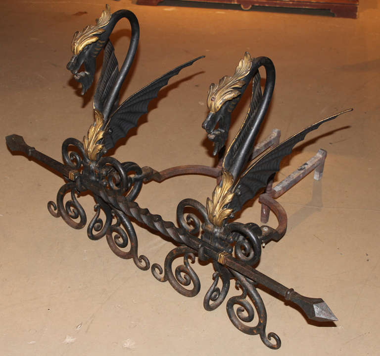 Bradley & Hubbard dragon form andirons. Late 19th / early 20th century, signed “B & H 9533,” and includes log bar.